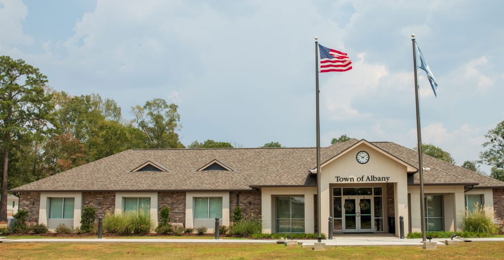 Albany Town Hall exterior with flags