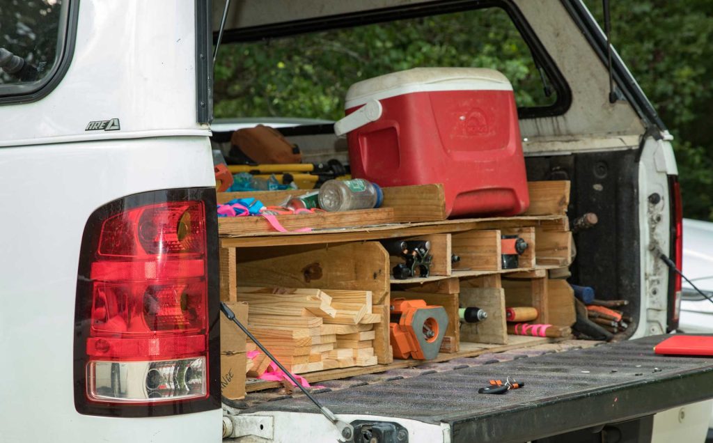 Boundary survey supplies in truck bed