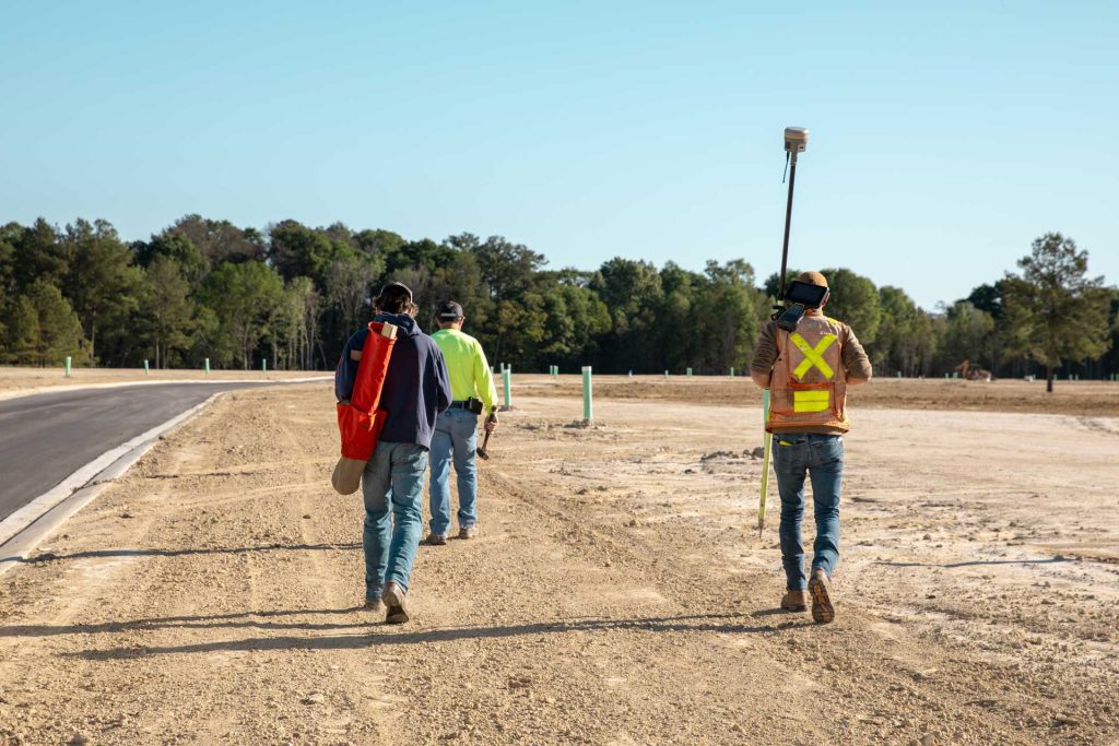 Construction stakeout crew members